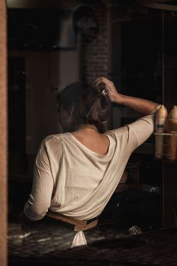 GIRL IN THE WINDOW